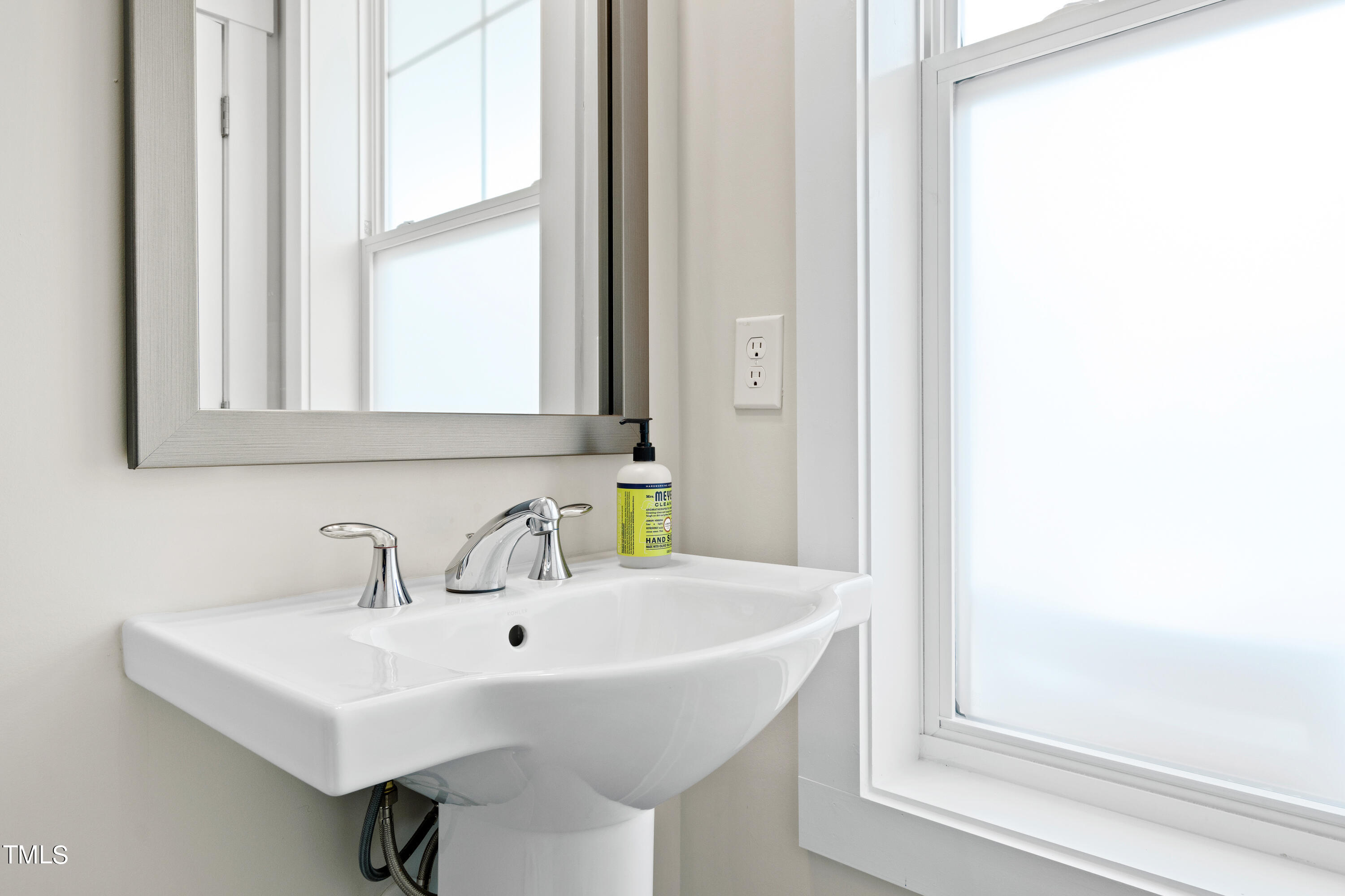 119 Dunloe Loop Raleigh, NC 27603 - Photo 26 of 51 a white sink and a window