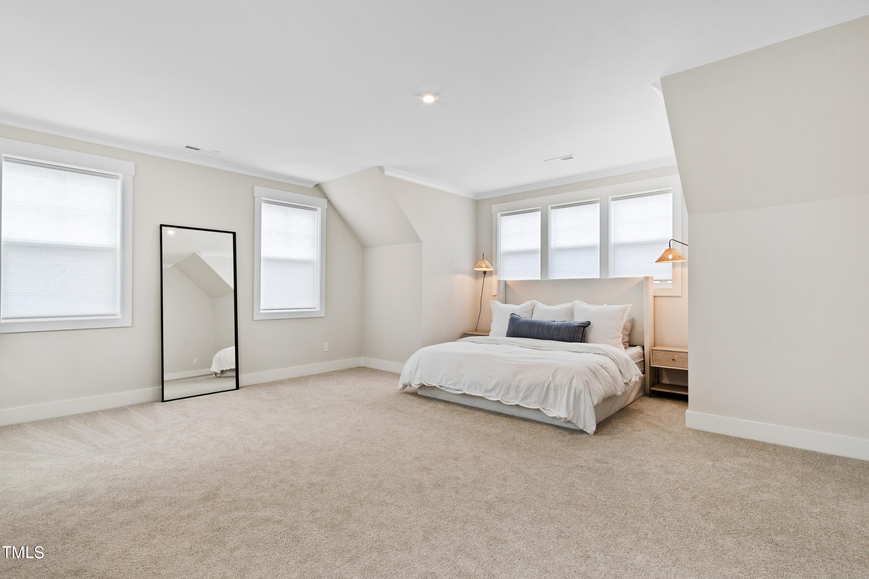 119 Dunloe Loop Raleigh, NC 27603 - Photo 28 of 51 a spacious bedroom with a bed and a window