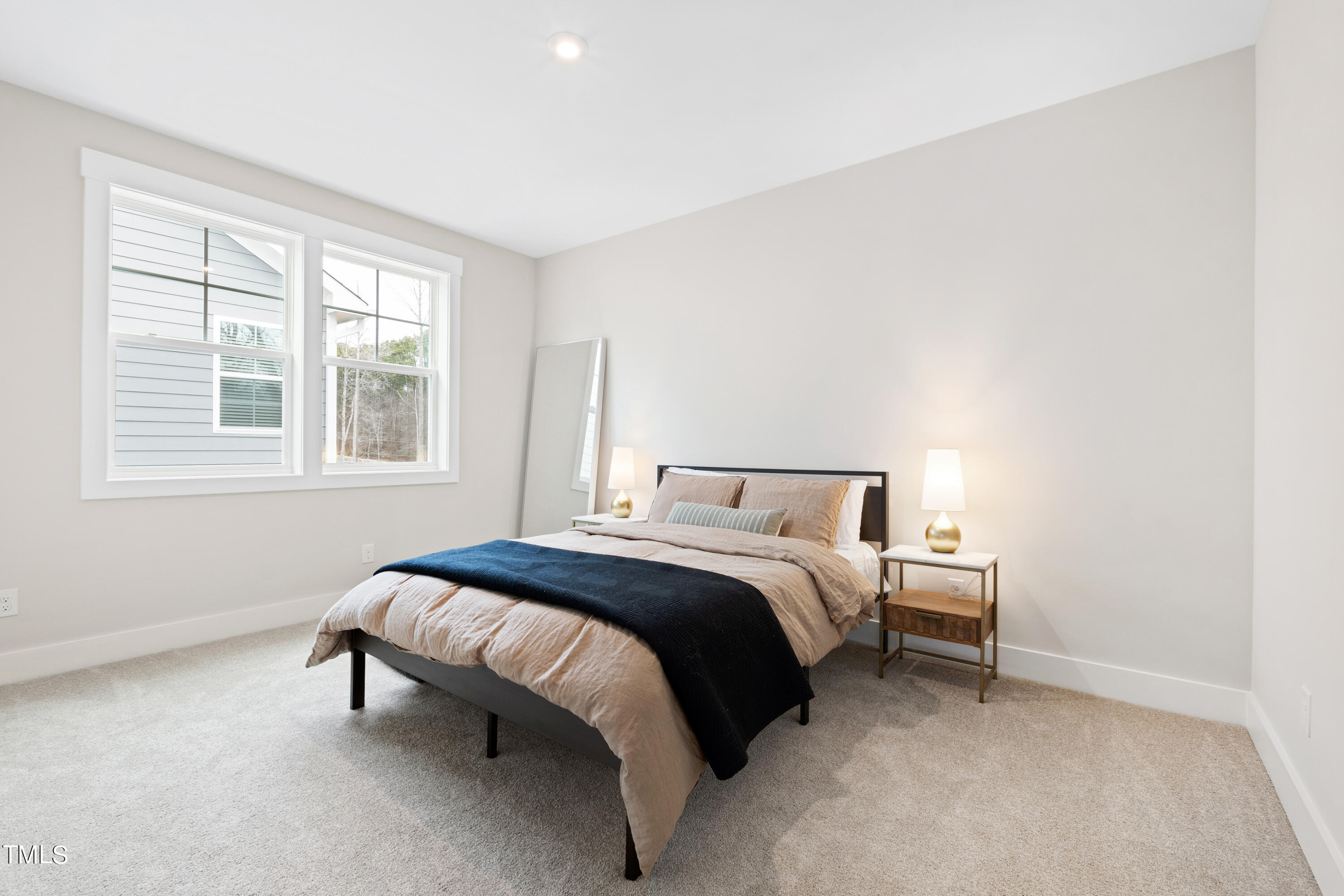 119 Dunloe Loop Raleigh, NC 27603 - Photo 34 of 51 a bedroom with a bed and a window