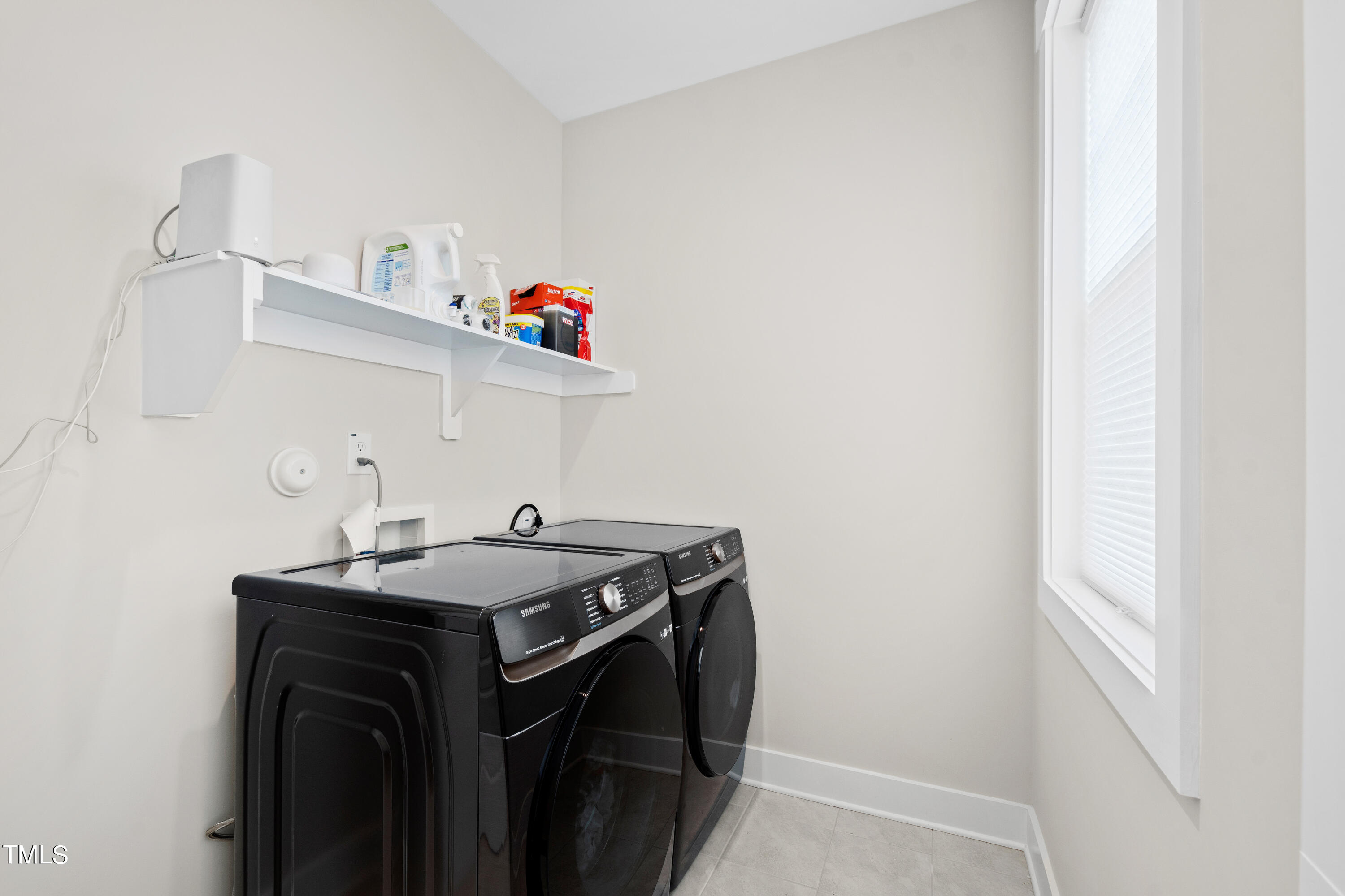 119 Dunloe Loop Raleigh, NC 27603 - Photo 39 of 51 a bathroom with a sink and a mirror