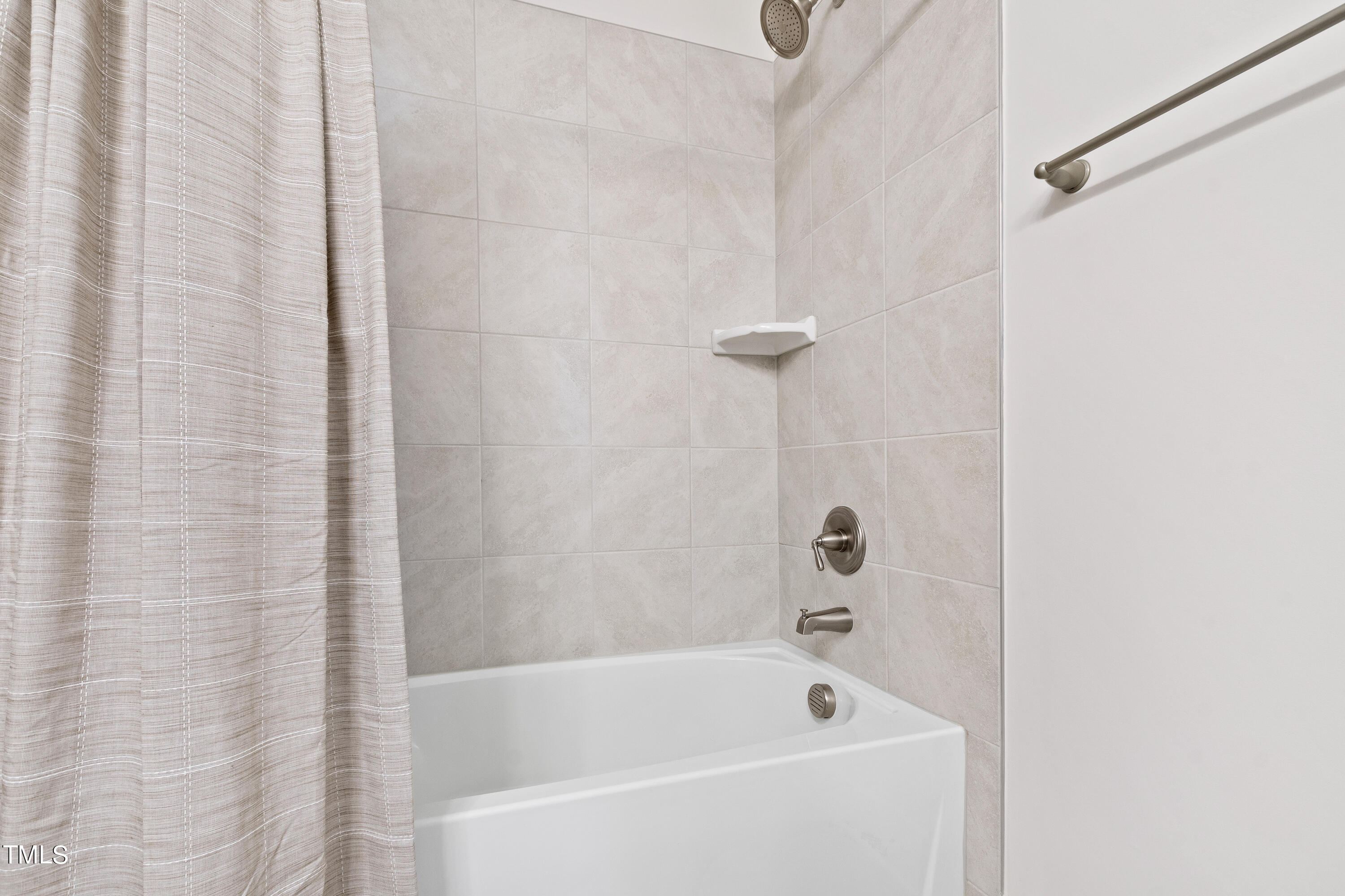 119 Dunloe Loop Raleigh, NC 27603 - Photo 45 of 51 a bathroom with a bathtub