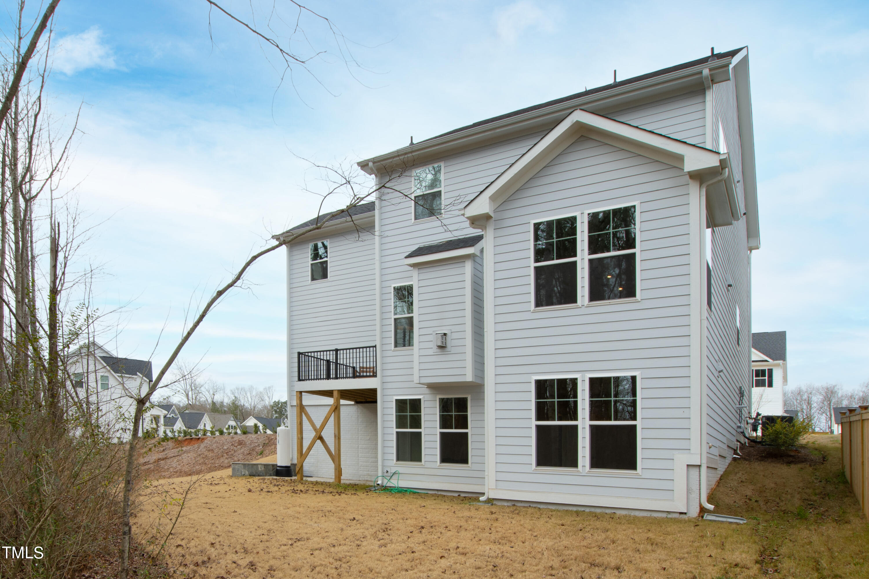 119 Dunloe Loop Raleigh, NC 27603 - Photo 48 of 51 a view of a house with a backyard