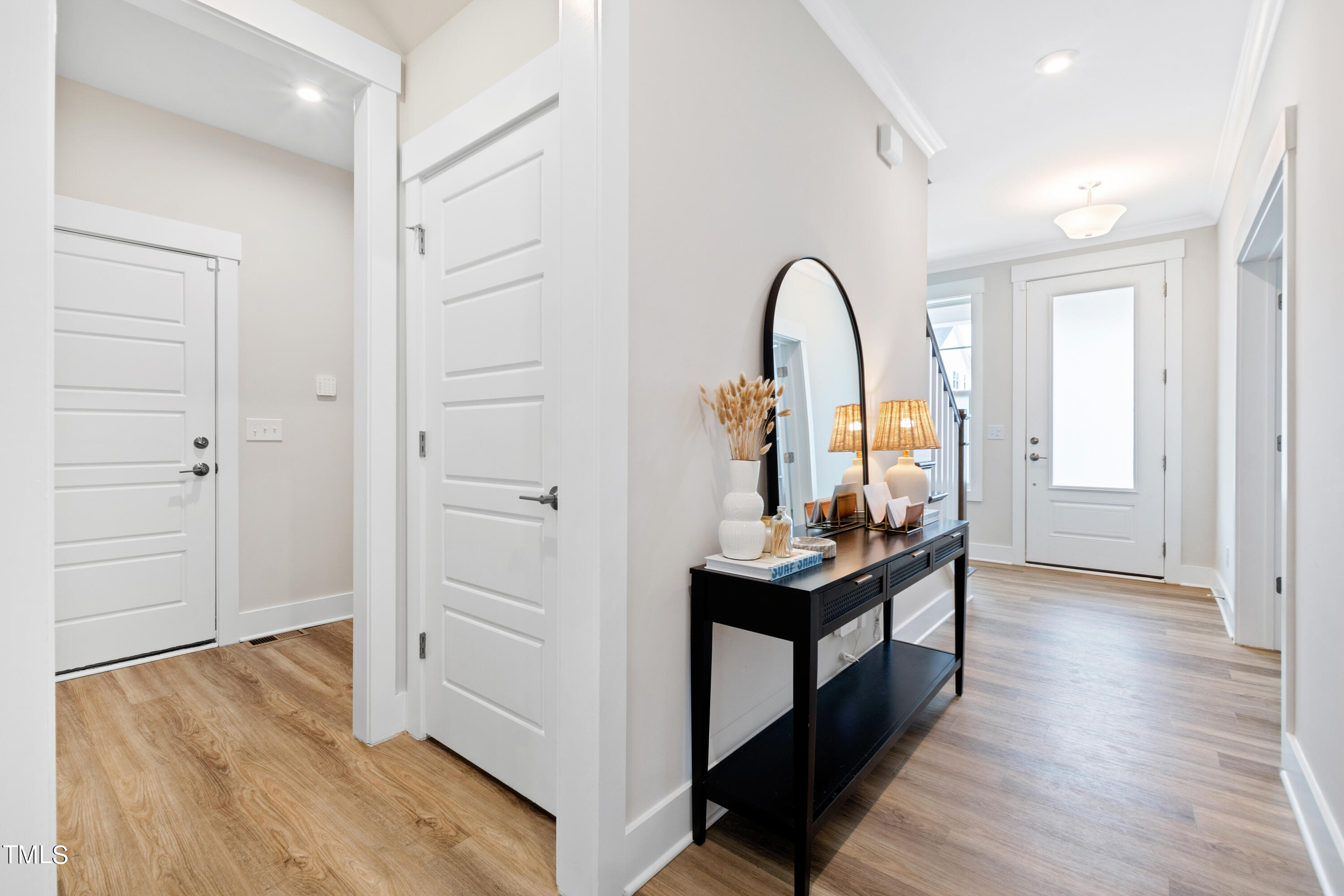 119 Dunloe Loop Raleigh, NC 27603 - Photo 9 of 51 a view of a hardwood floor and an entryway
