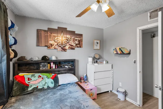 a room with toys and dresser