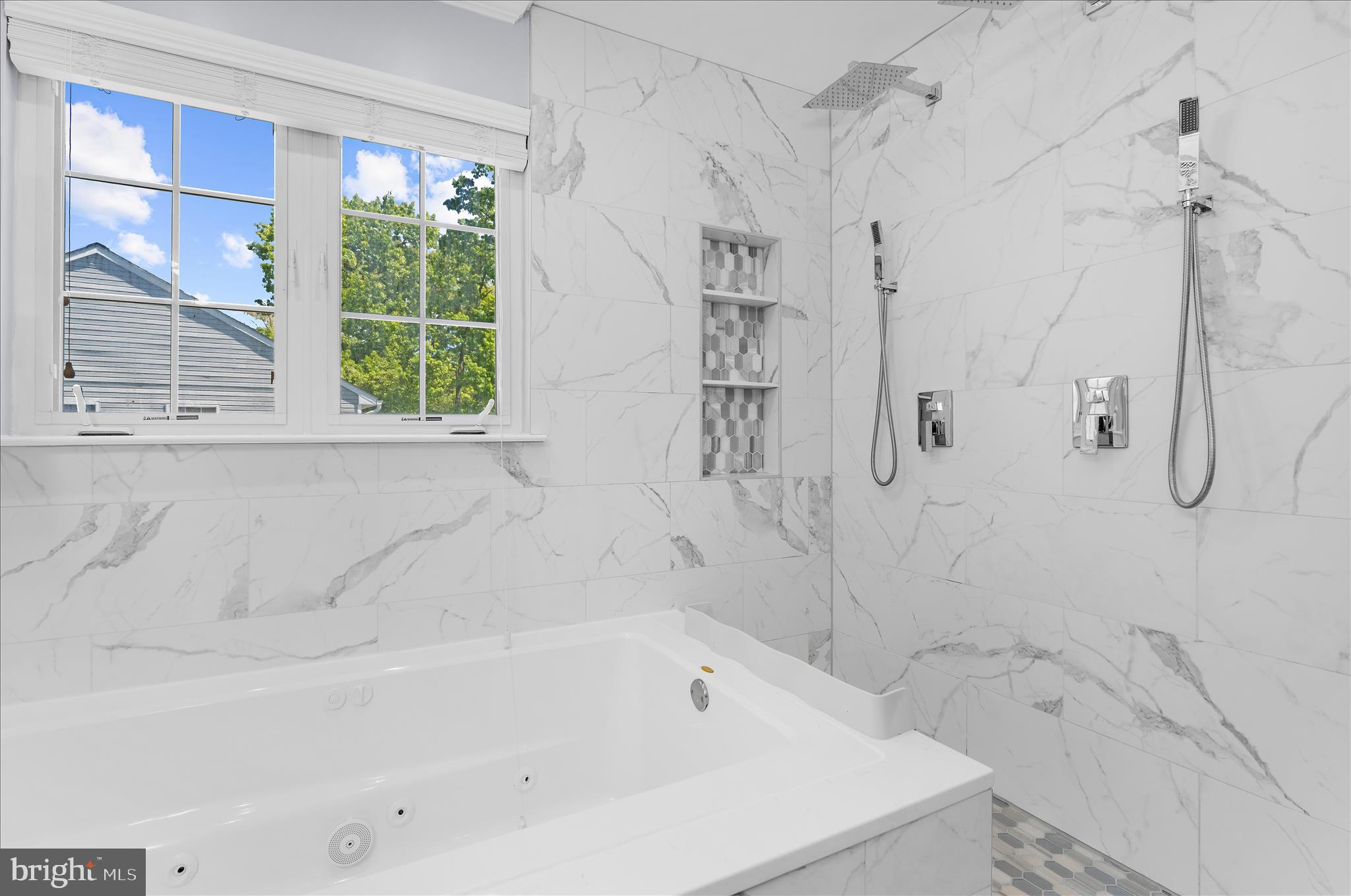 8028 High Oak Road Glen Burnie, MD 21060 - Photo 24 of 65 a bathroom with a bathtub and shower