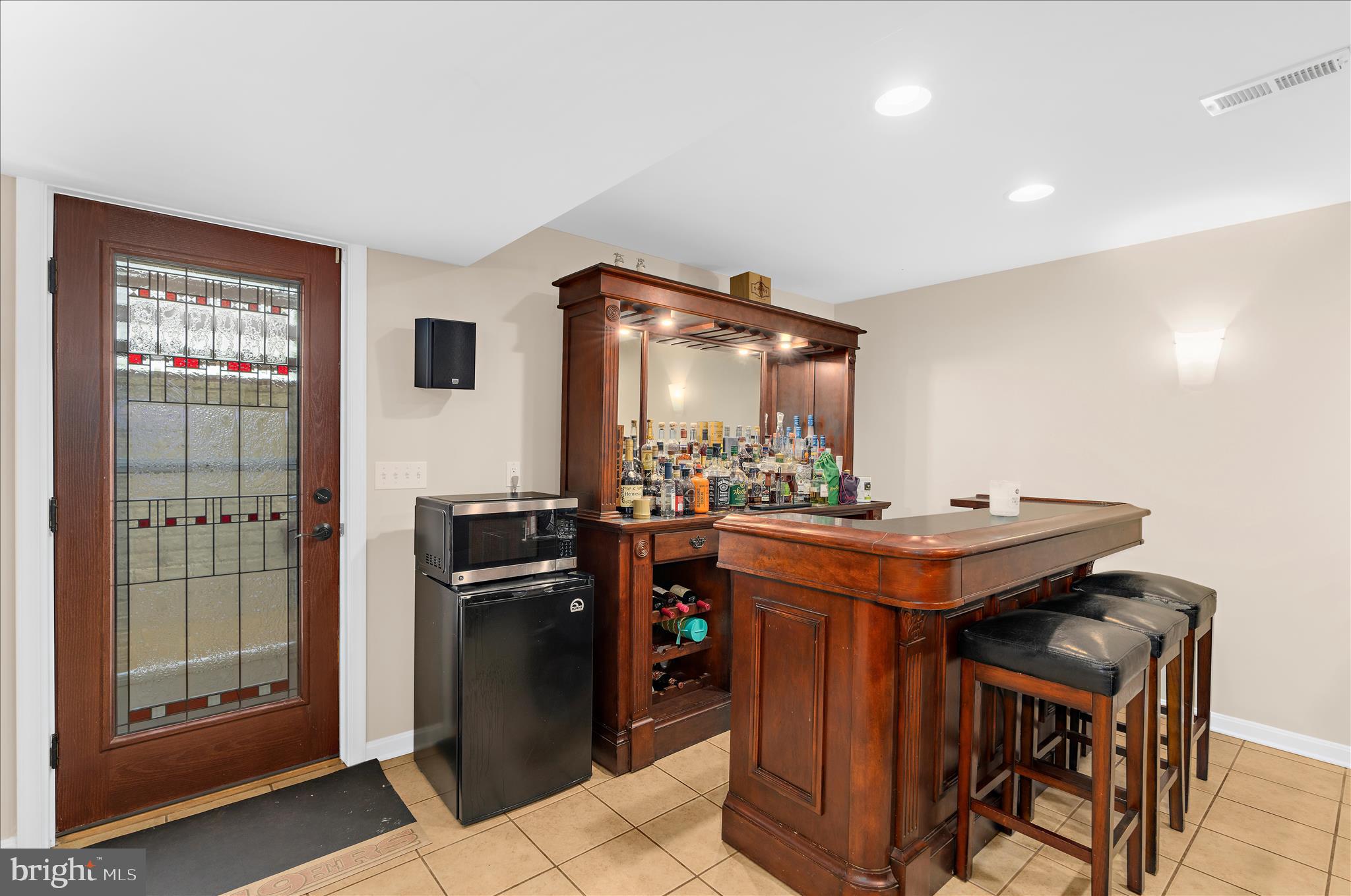 8028 High Oak Road Glen Burnie, MD 21060 - Photo 38 of 65 a kitchen with stainless steel appliances granite countertop a stove and a refrigerator