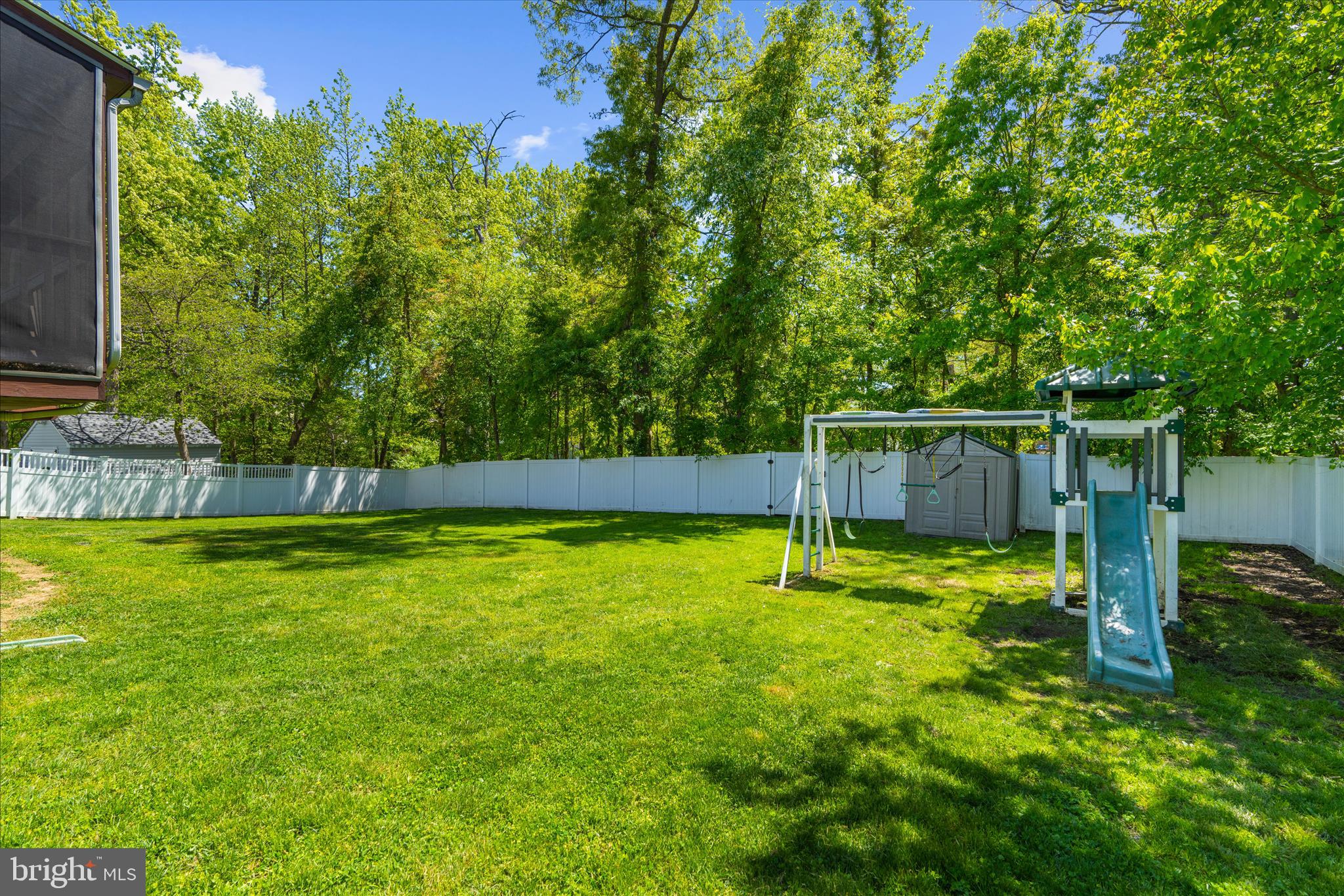 8028 High Oak Road Glen Burnie, MD 21060 - Photo 48 of 65 a view of a yard with a small pool