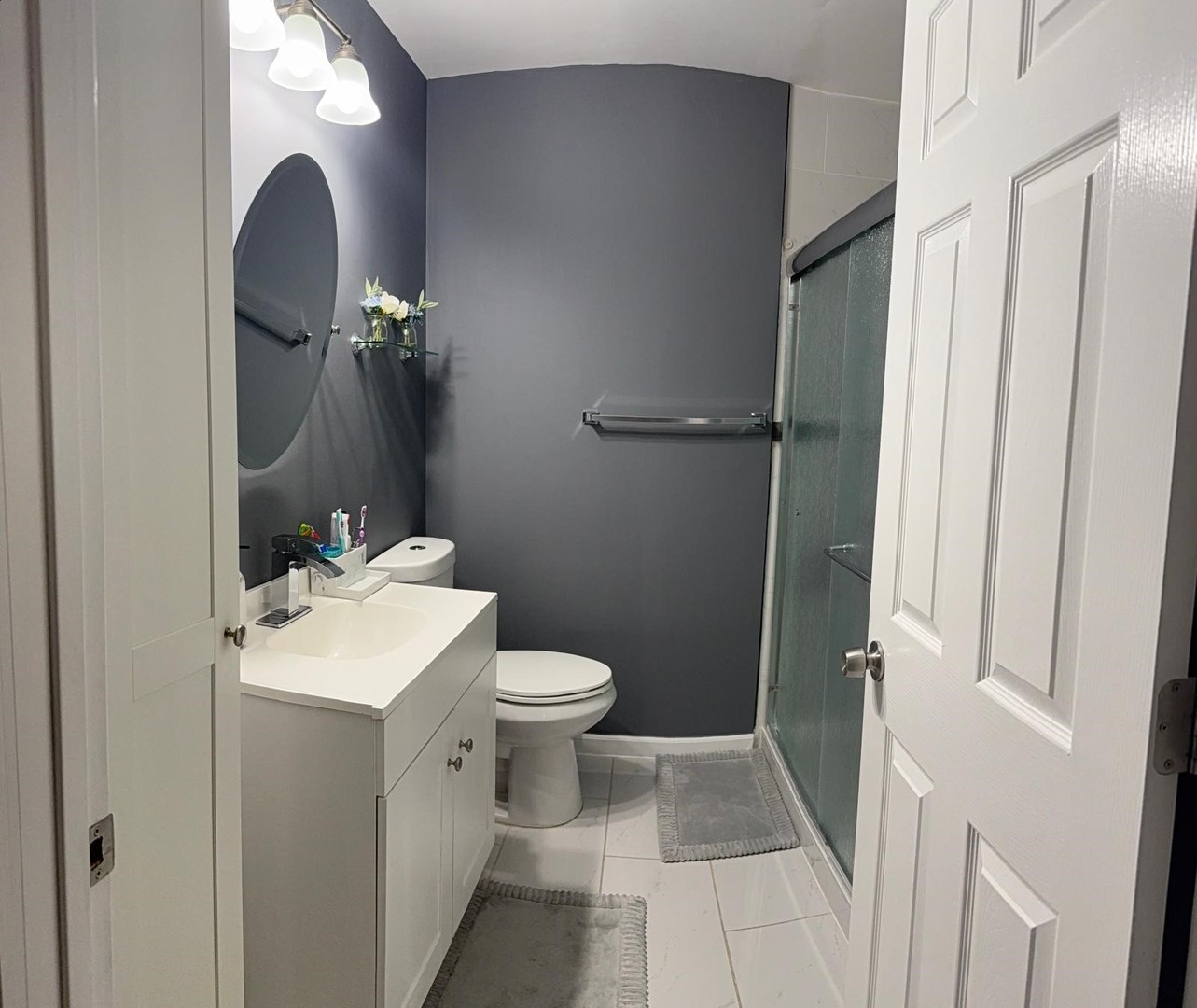 8001 North Elmore Street Niles, IL 60714 - Photo 22 of 34 a bathroom with a sink and a toilet