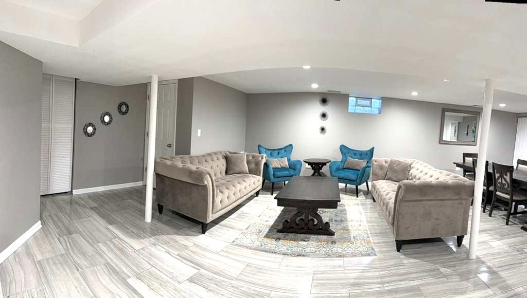 8001 North Elmore Street Niles, IL 60714 - Photo 28 of 34 a living room with furniture and a wooden floor