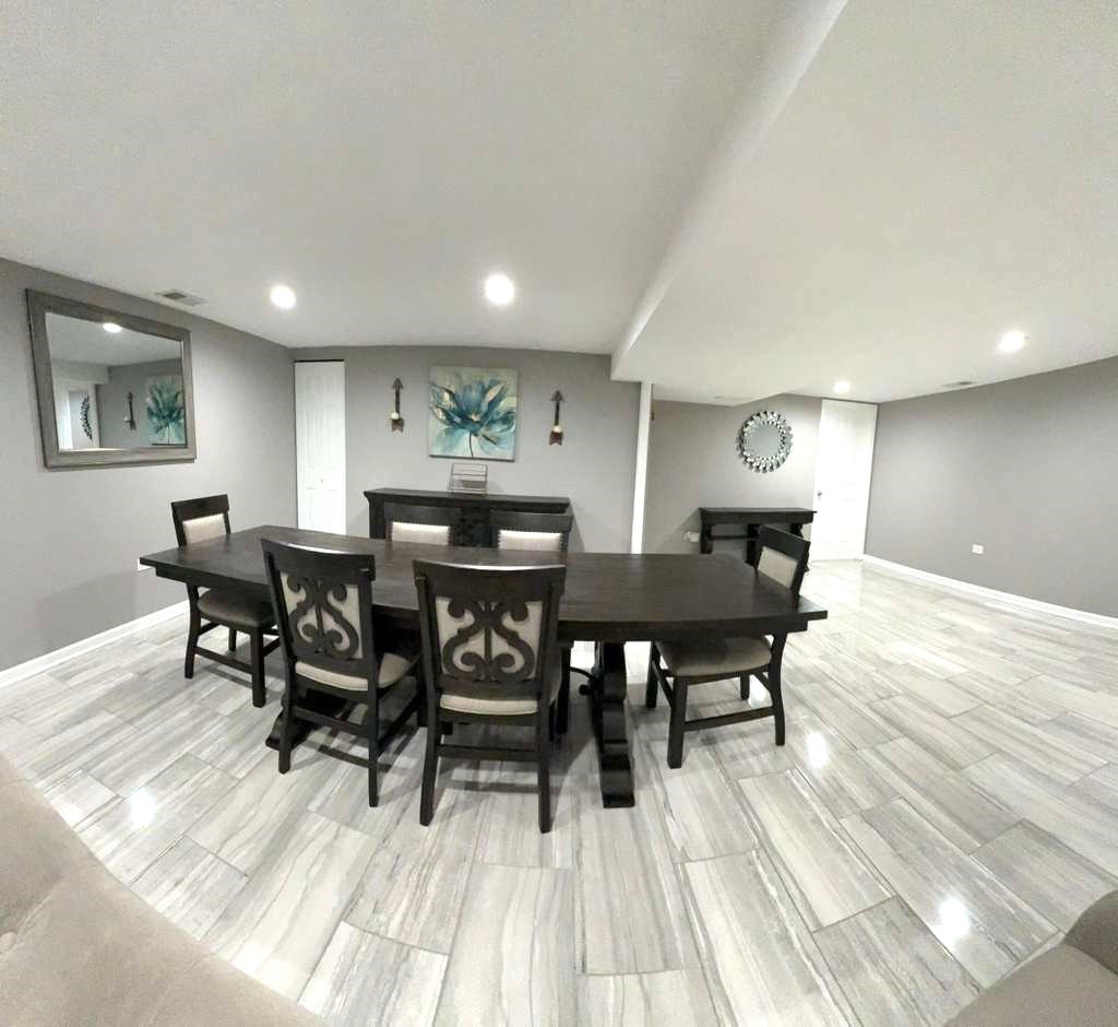 8001 North Elmore Street Niles, IL 60714 - Photo 30 of 34 a view of a dining room with furniture and wooden floor