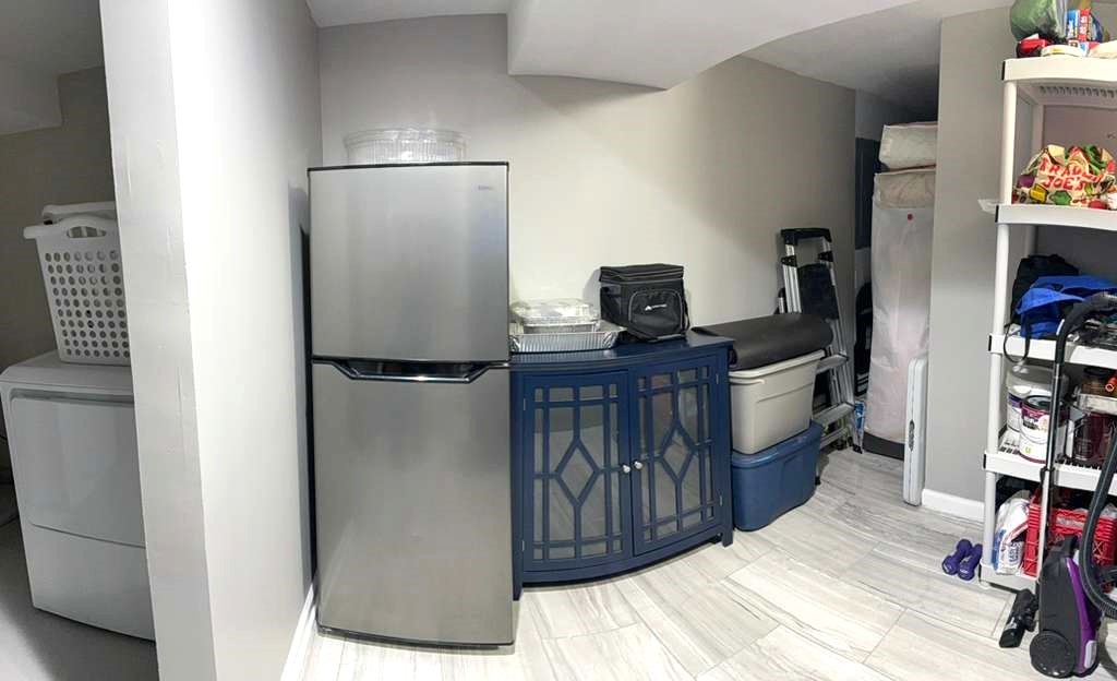 8001 North Elmore Street Niles, IL 60714 - Photo 34 of 34 a walk in closet with wooden floor