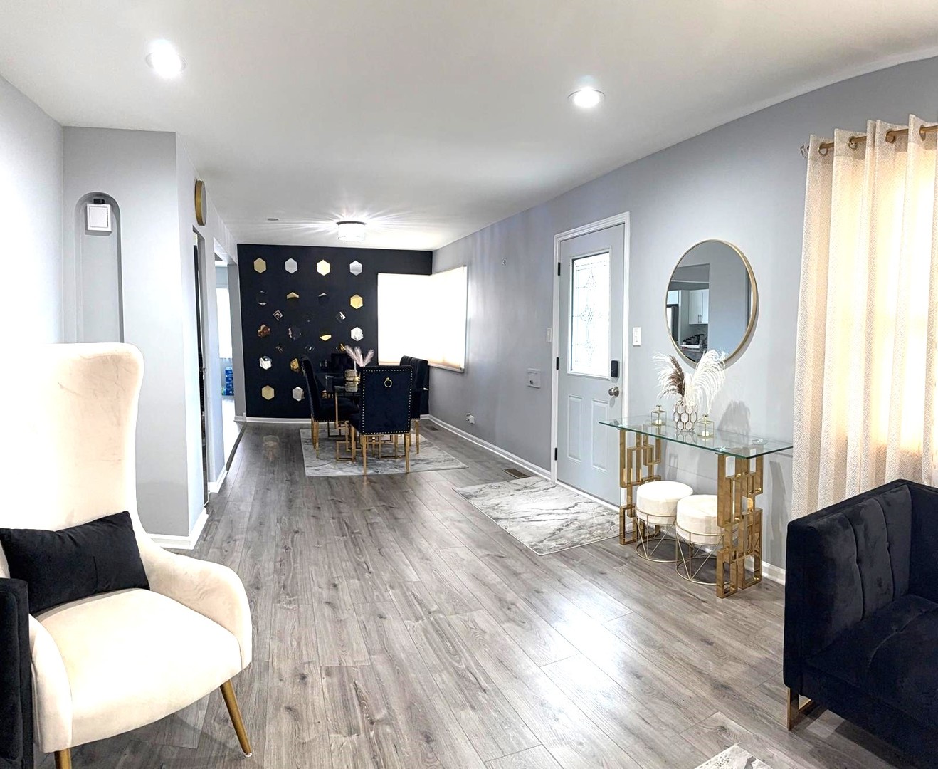 8001 North Elmore Street Niles, IL 60714 - Photo 7 of 34 a living room with furniture and a wooden floor