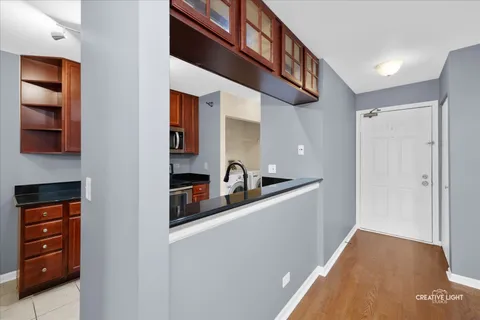 a hallway with cabinets