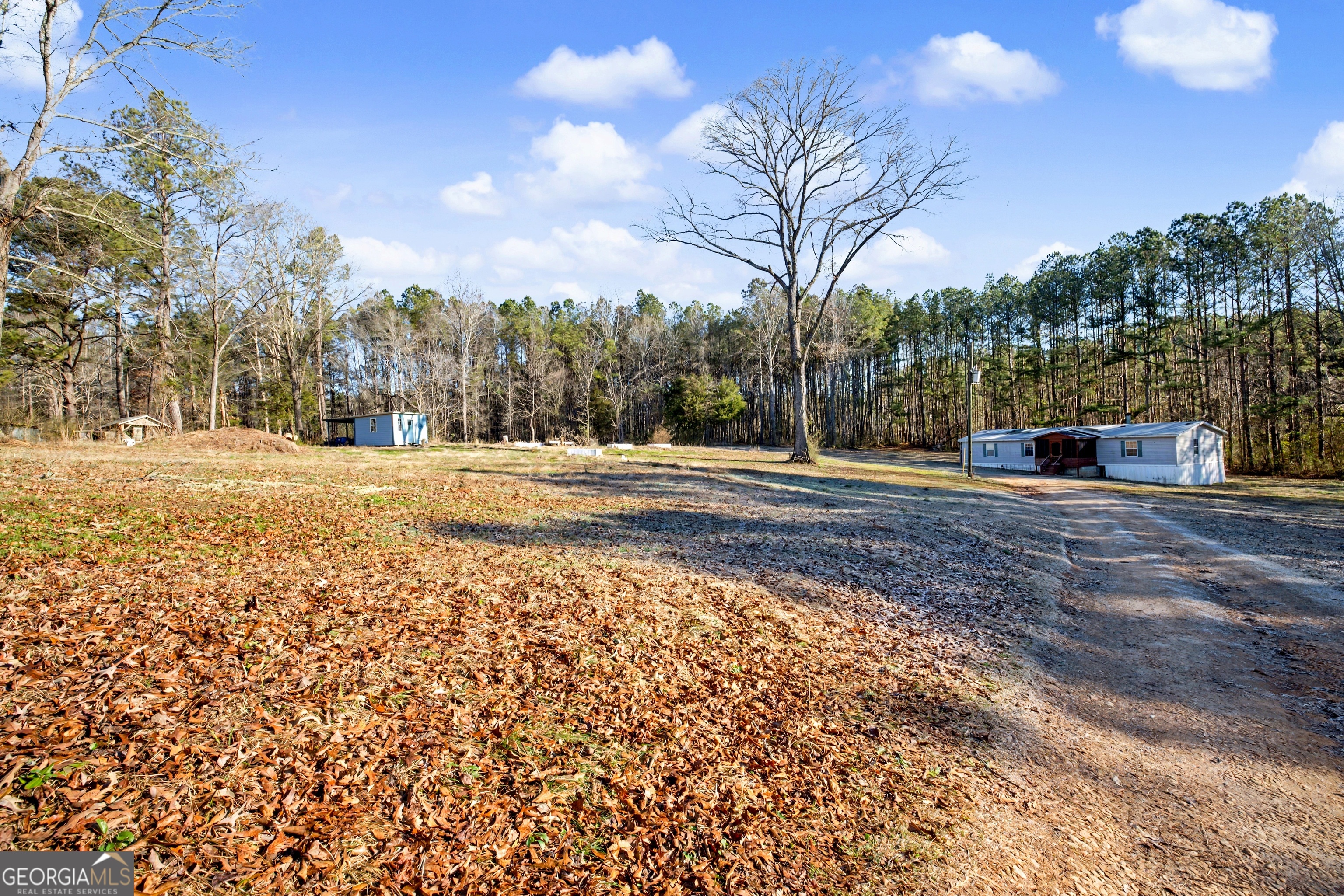 90 Cooksville Road Hogansville, GA 30230 - Photo 2 of 26 a view of road with trees