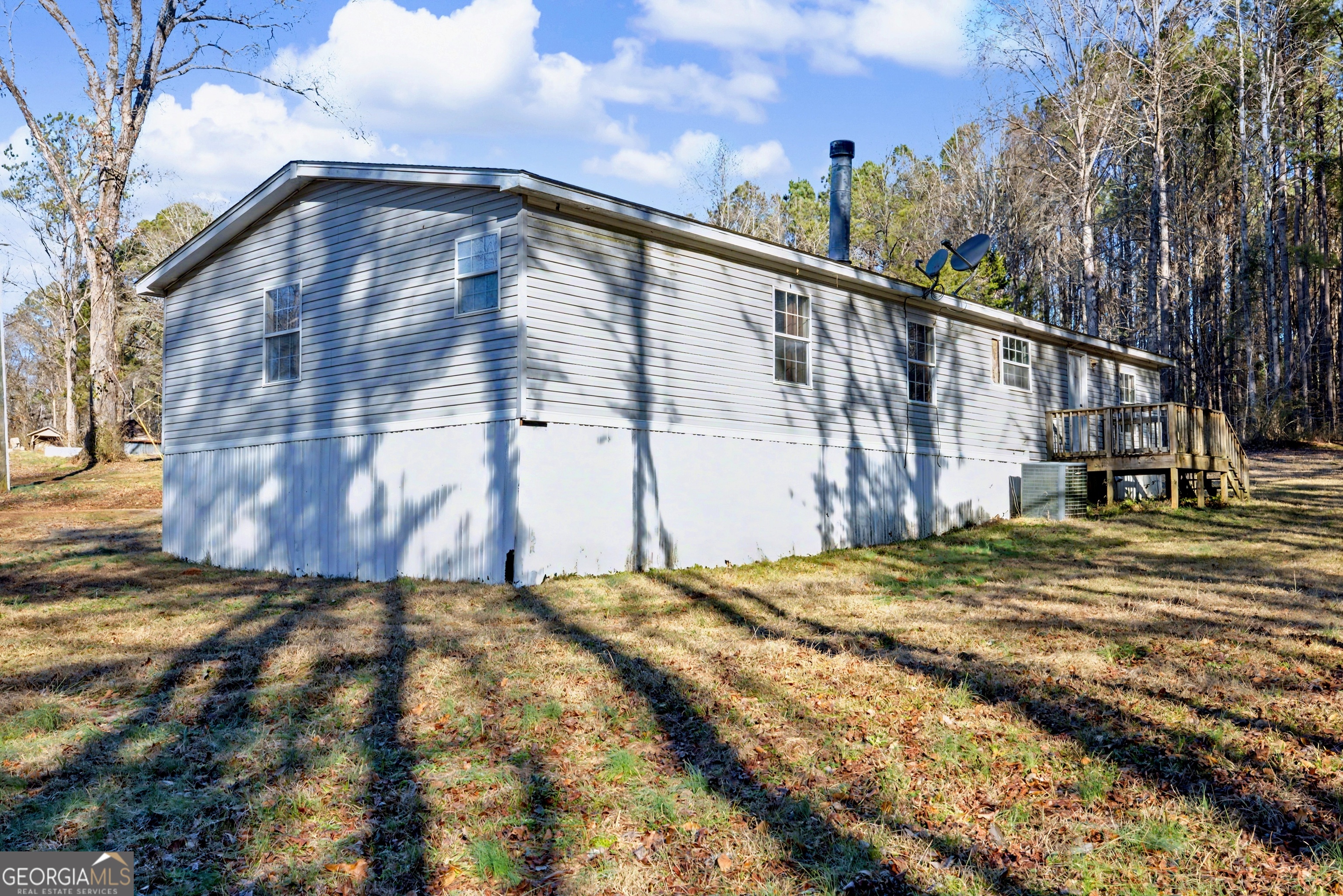90 Cooksville Road Hogansville, GA 30230 - Photo 25 of 26 a view of a house with a yard