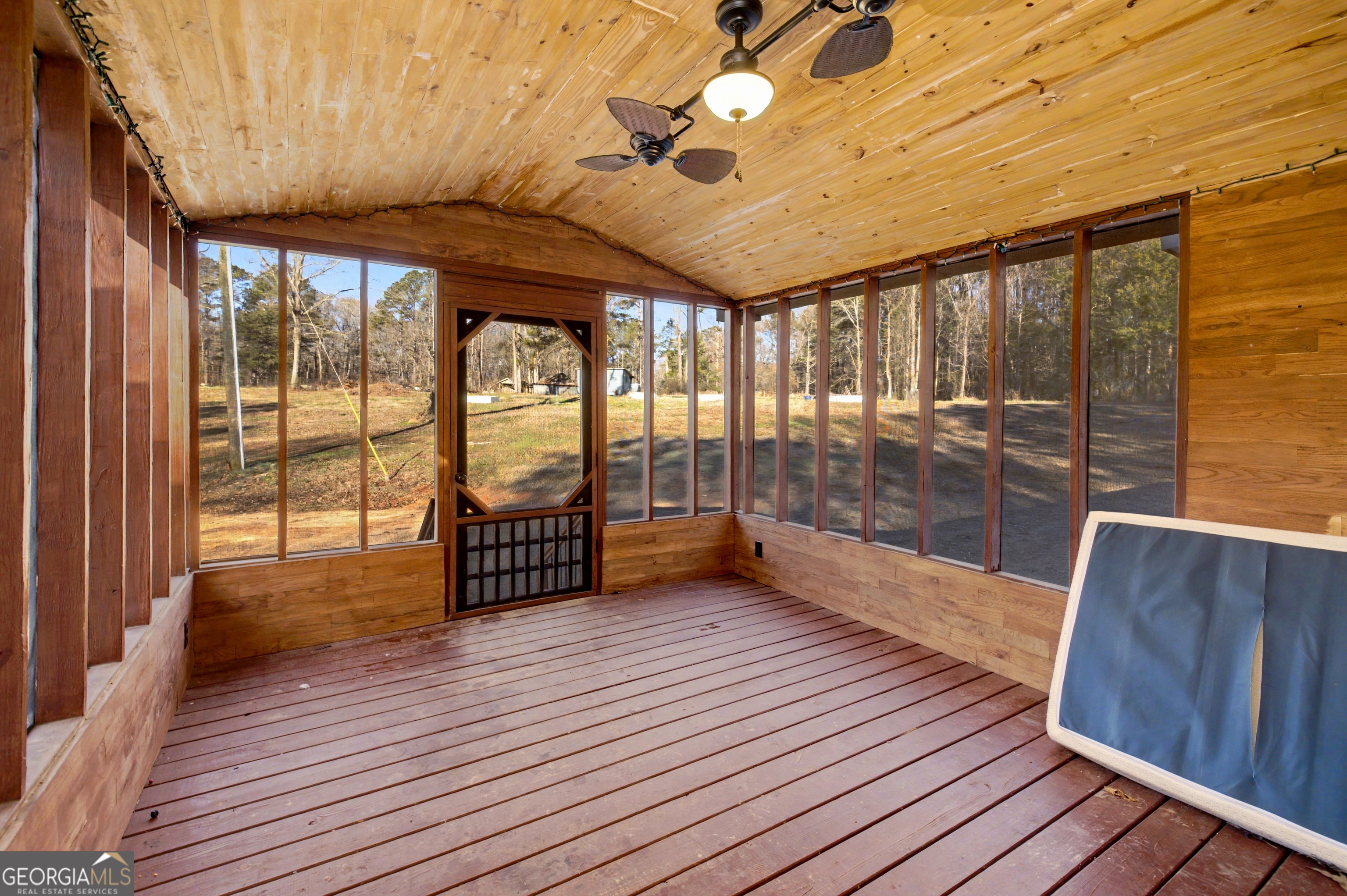90 Cooksville Road Hogansville, GA 30230 - Photo 3 of 26 a view of a room with wooden floor and large windows