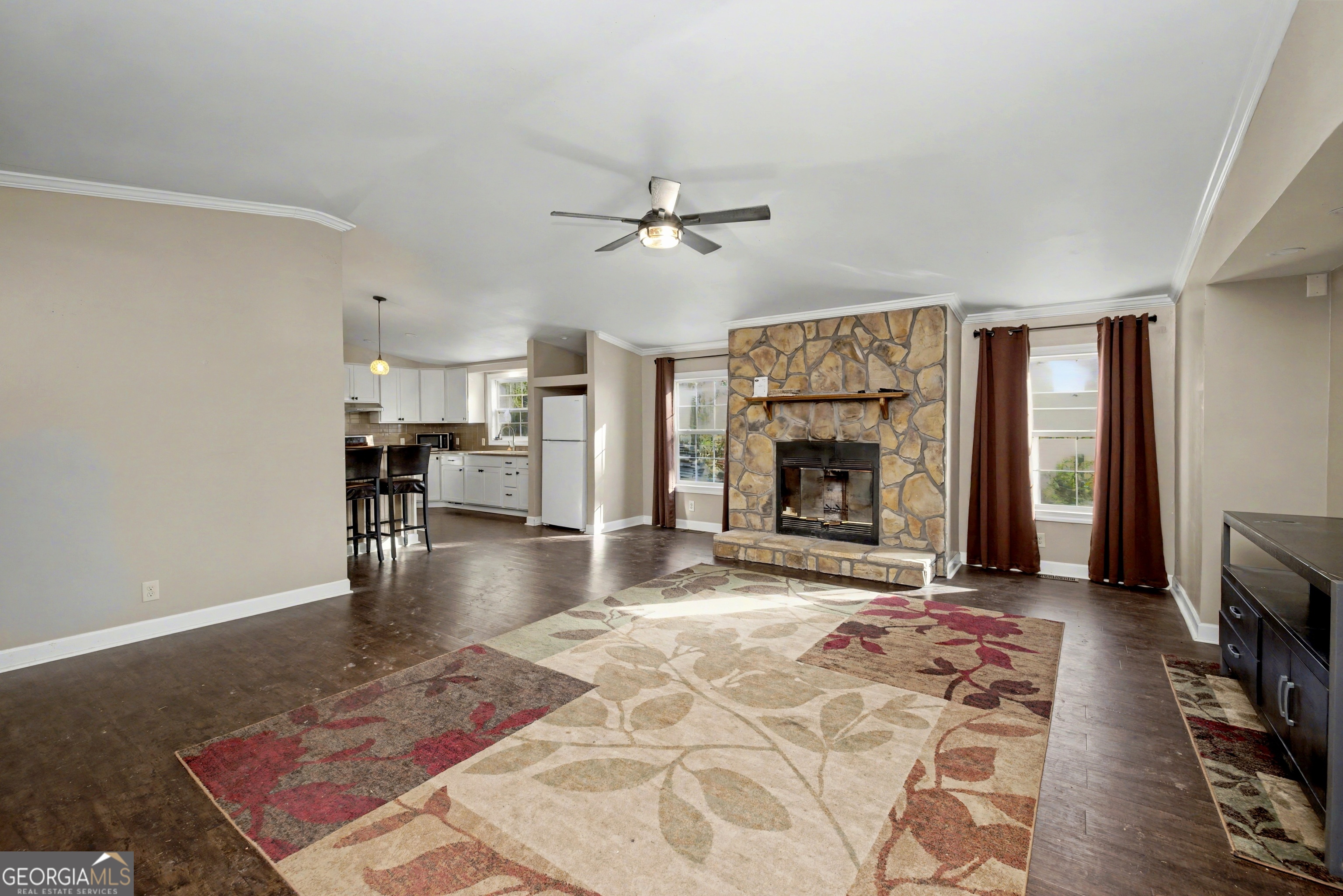 90 Cooksville Road Hogansville, GA 30230 - Photo 7 of 26 a living room with furniture and a fireplace