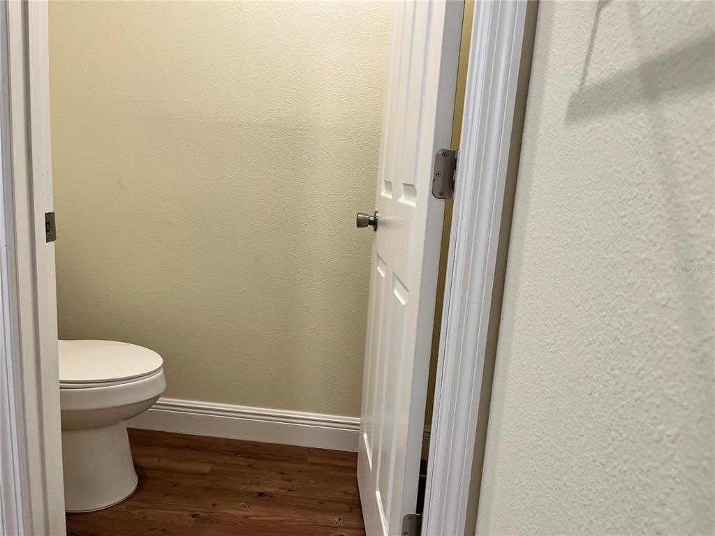 4441 Palmarito Street Sebring, FL 33872 - Photo 15 of 33 a bathroom with a sink and a toilet