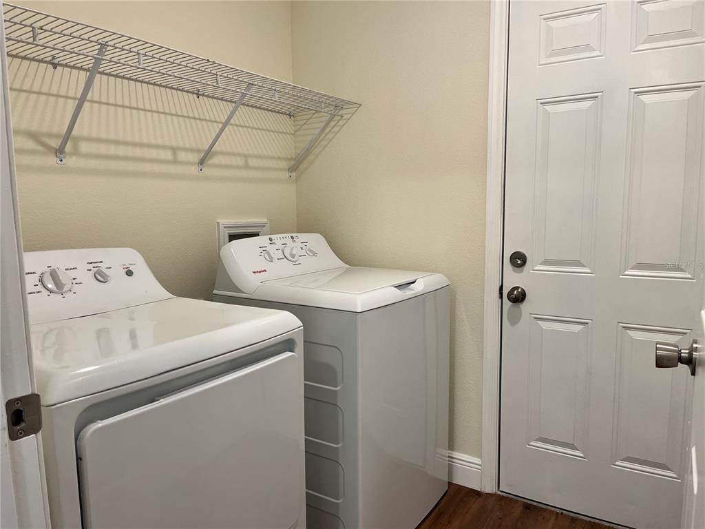 4441 Palmarito Street Sebring, FL 33872 - Photo 28 of 33 a utility room with dryer and washer