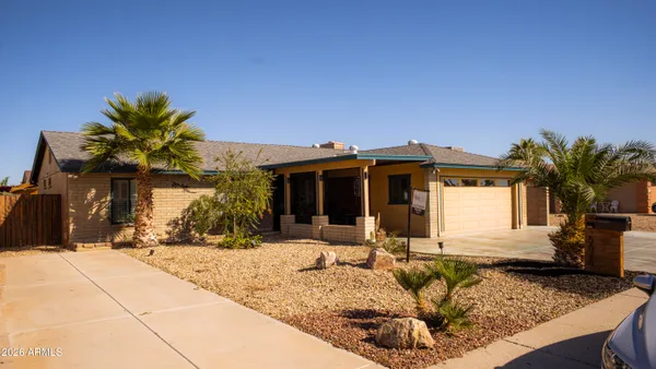 a view of a house with snow on the floor