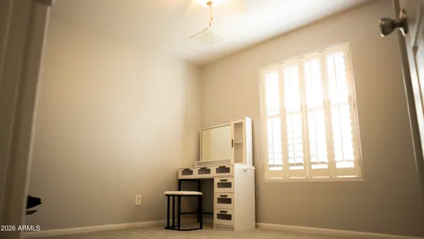 a view of empty room with closet