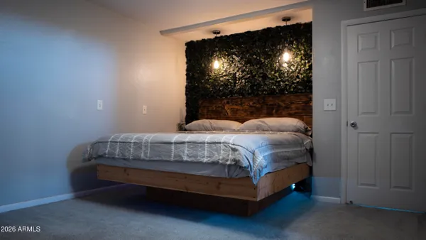 a bathroom with a sink and mirror