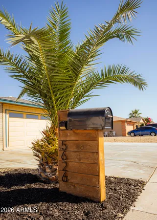 a view of a house with a street