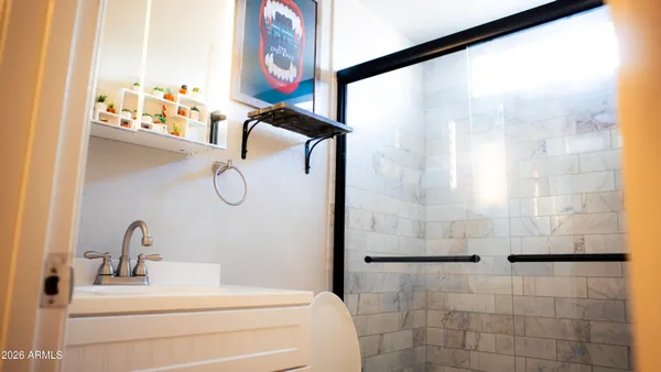 a view of a house with retail shops