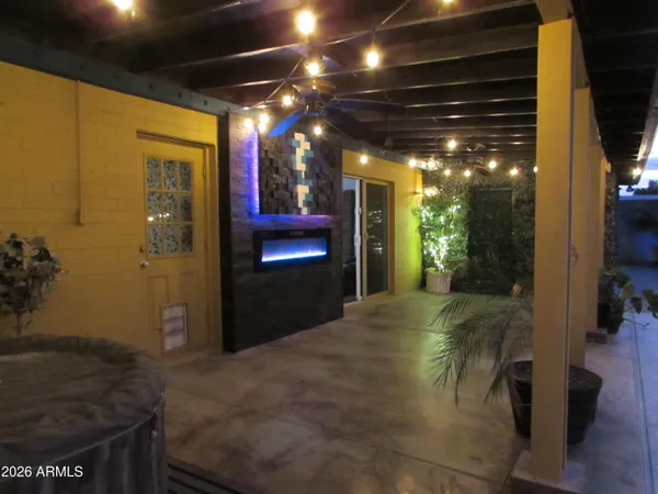 a view of street with lots of tall trees