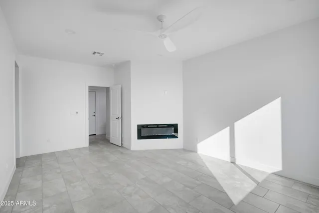 an empty room with a bathroom