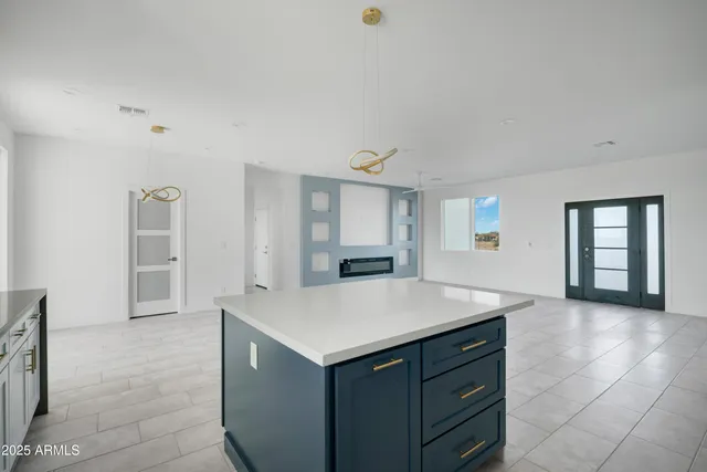 a view of kitchen and sink