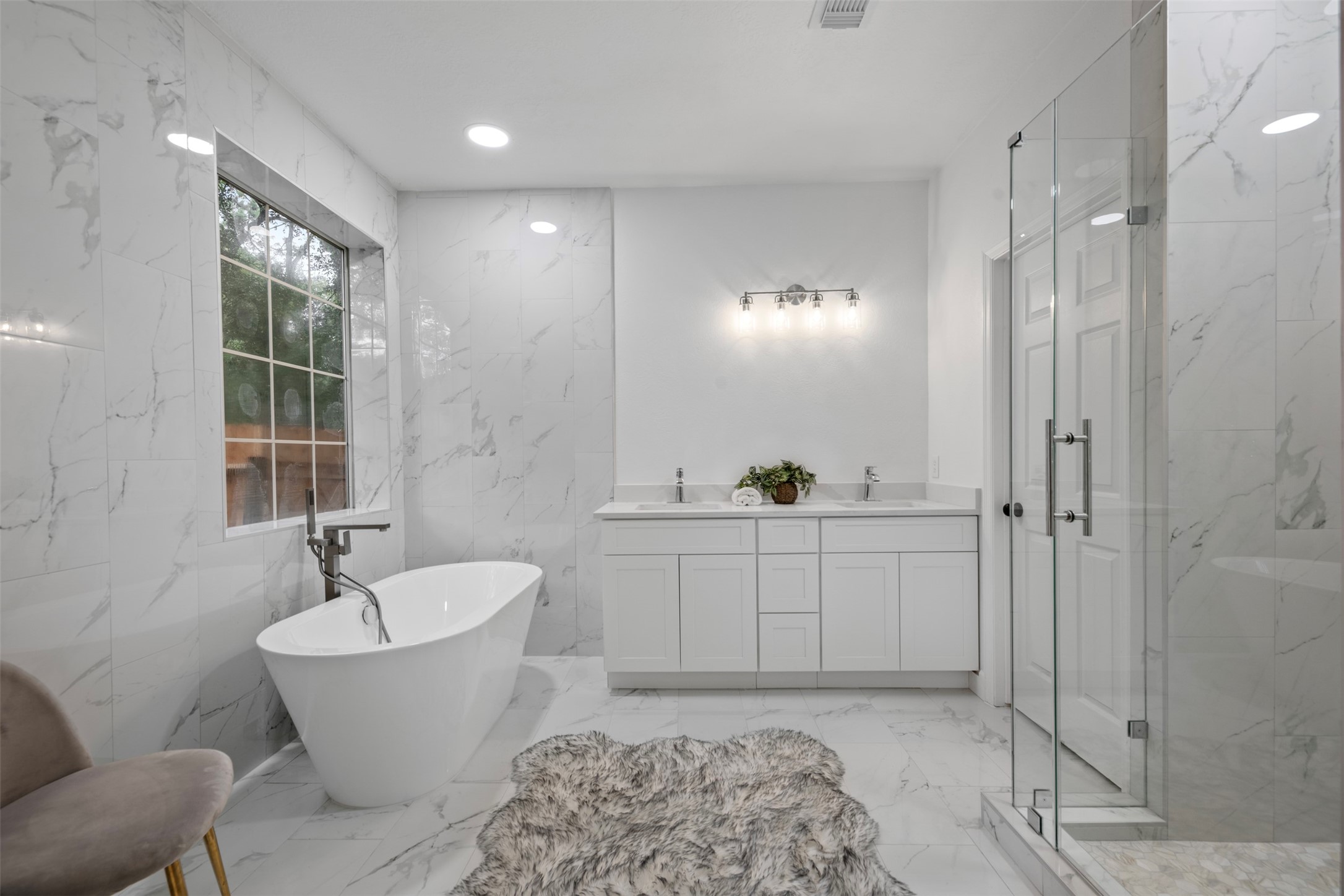 55 Terraglen Drive Spring, TX 77382 - Photo 11 of 33 a bathroom with a bathtub and a sink