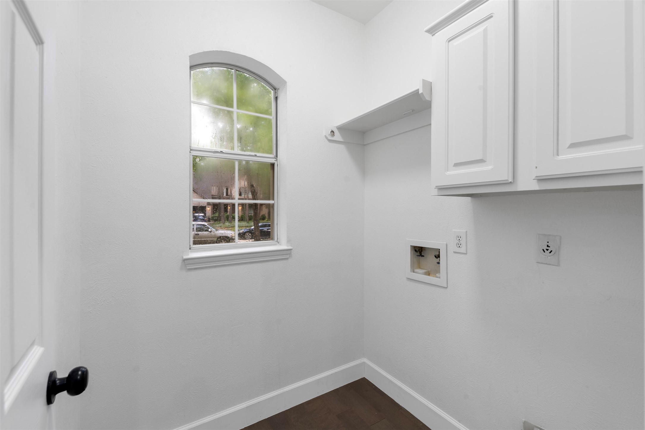 55 Terraglen Drive Spring, TX 77382 - Photo 18 of 33 a view of an entryway with wooden floor and cabinet