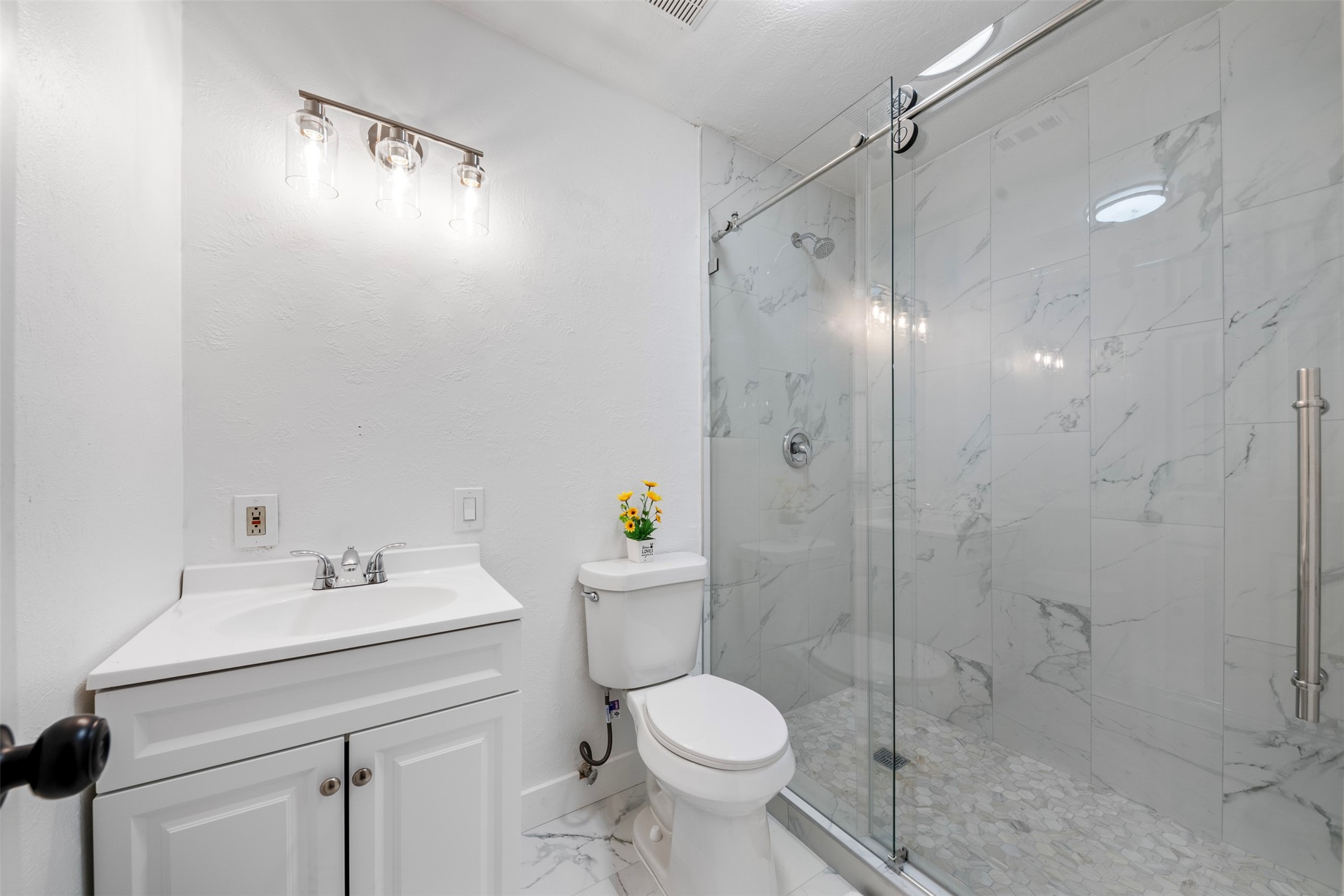 55 Terraglen Drive Spring, TX 77382 - Photo 19 of 33 a bathroom with a sink toilet and shower