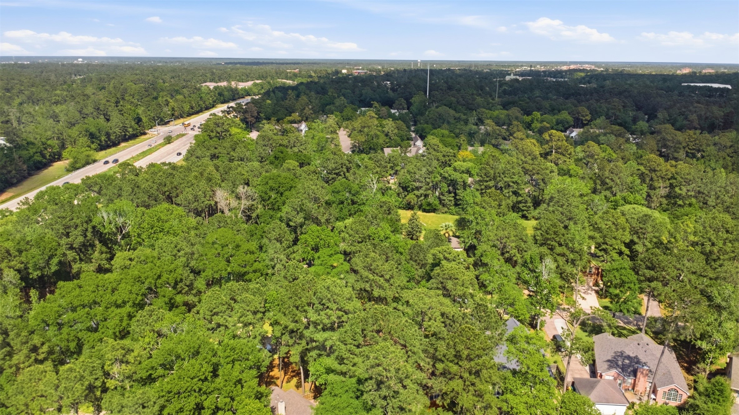 55 Terraglen Drive Spring, TX 77382 - Photo 26 of 33 an aerial view of residential houses with outdoor space and trees