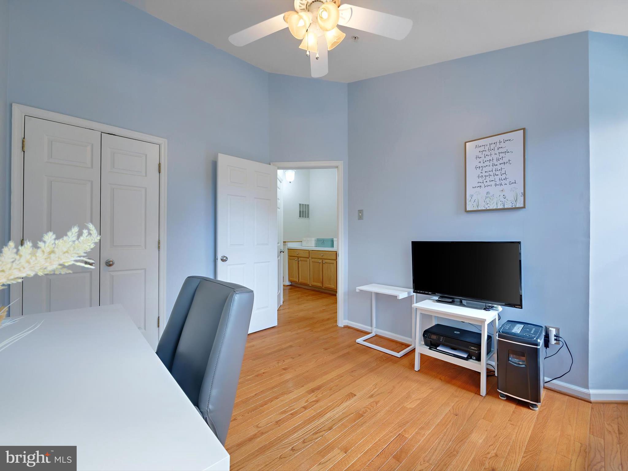 2355 Sandy Walk Way Odenton, MD 21113 - Photo 21 of 68 a view of a livingroom with furniture and a flat screen tv