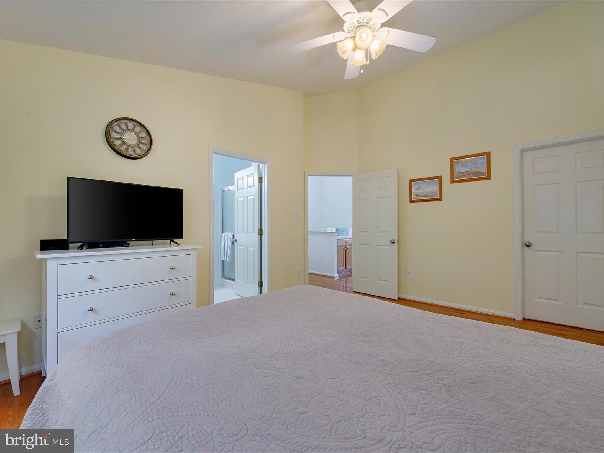 2355 Sandy Walk Way Odenton, MD 21113 - Photo 25 of 68 a view of a livingroom with an empty space and a flat screen tv