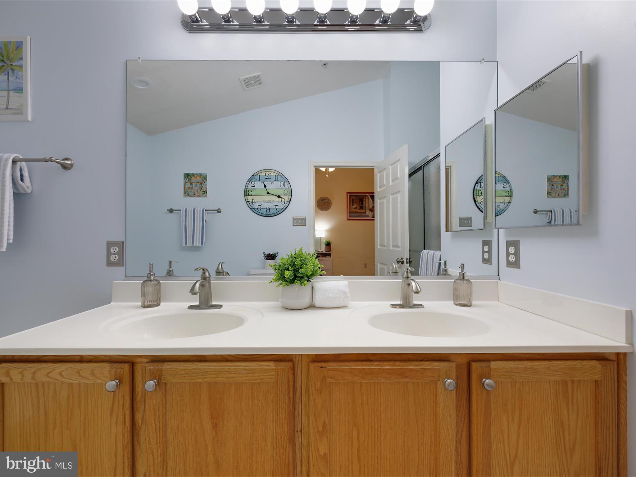 2355 Sandy Walk Way Odenton, MD 21113 - Photo 26 of 68 a bathroom with a sink and a mirror