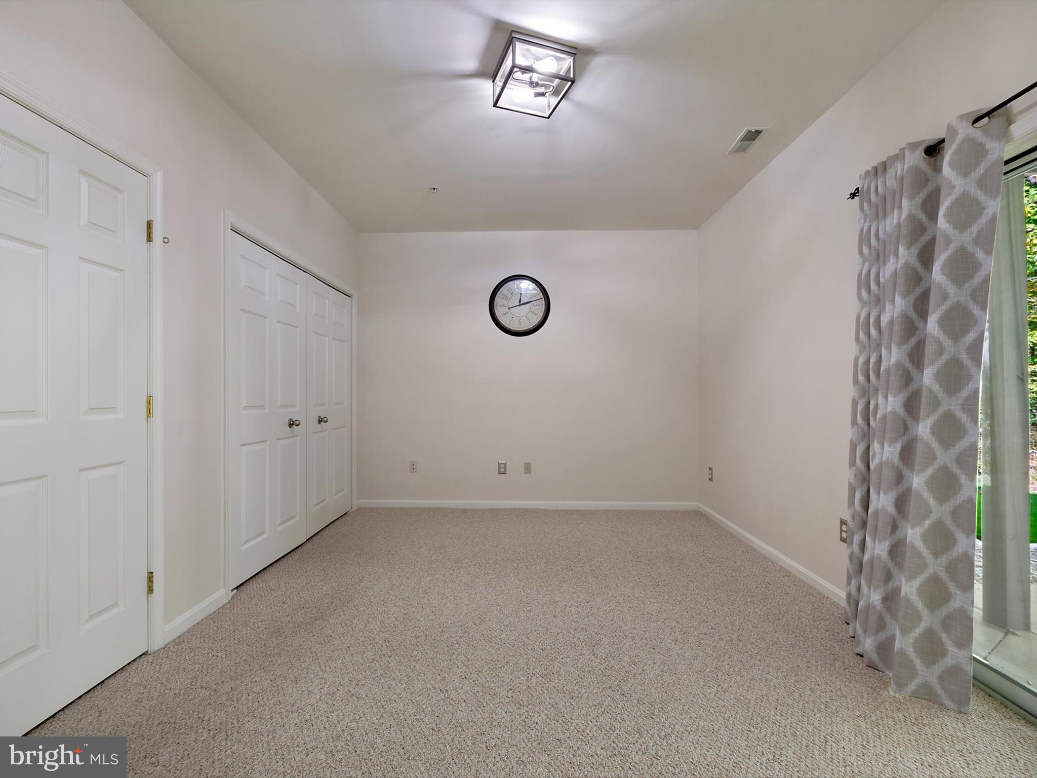 2355 Sandy Walk Way Odenton, MD 21113 - Photo 30 of 68 a view of an empty room with a window