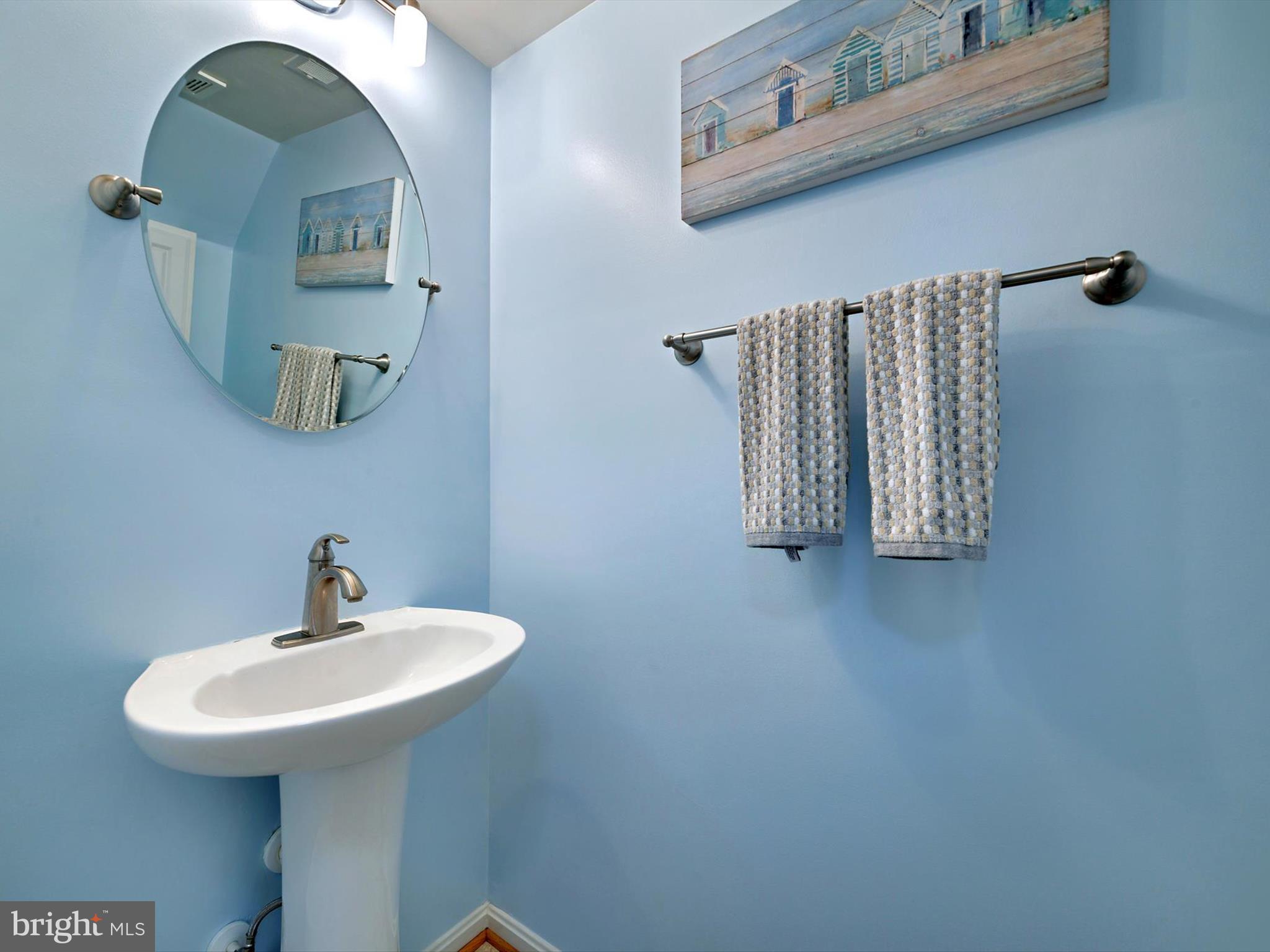 2355 Sandy Walk Way Odenton, MD 21113 - Photo 32 of 68 a bathroom with a sink and mirror