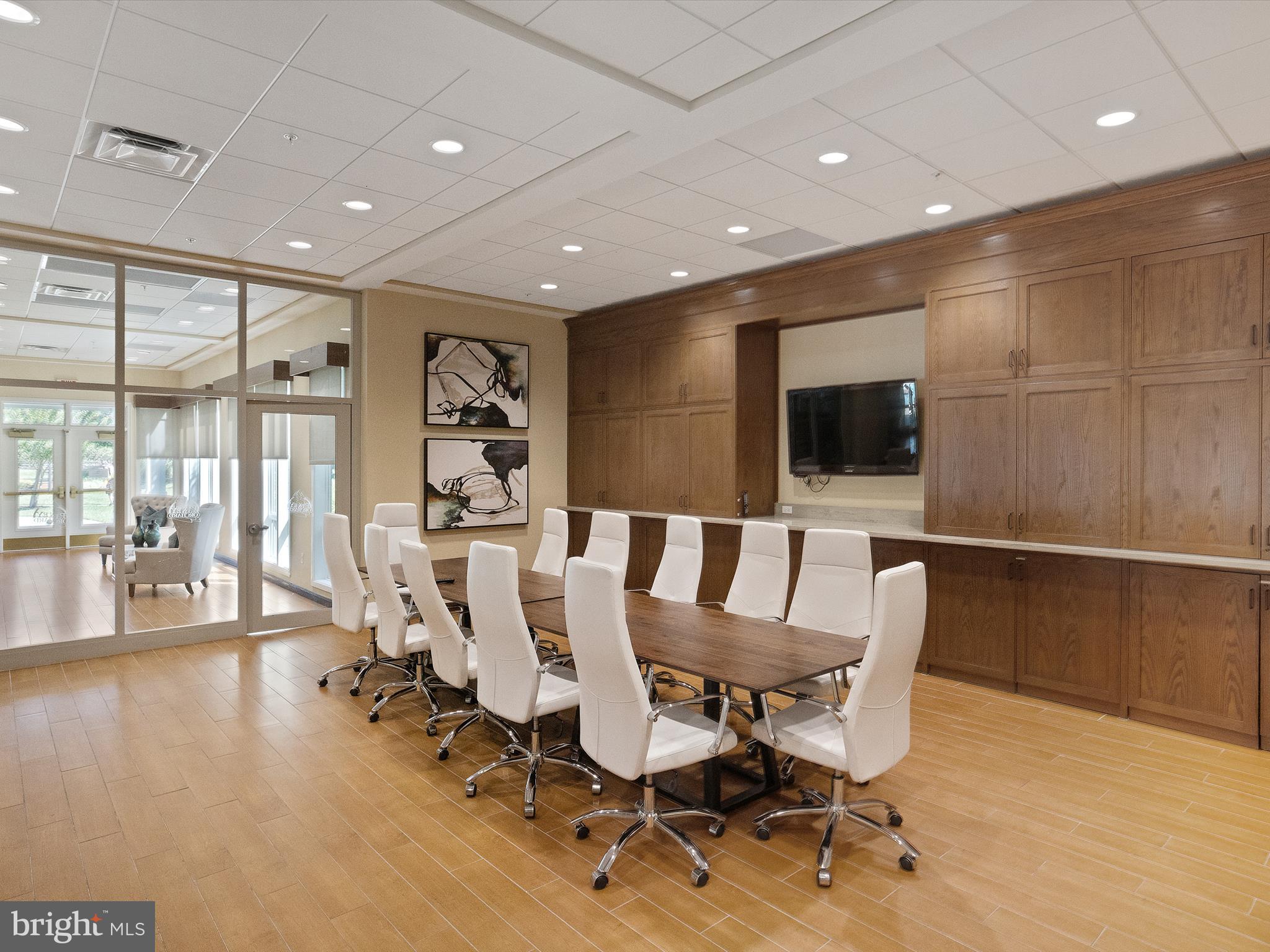 2355 Sandy Walk Way Odenton, MD 21113 - Photo 51 of 68 a view of a dining room with furniture wooden floor and chandelier