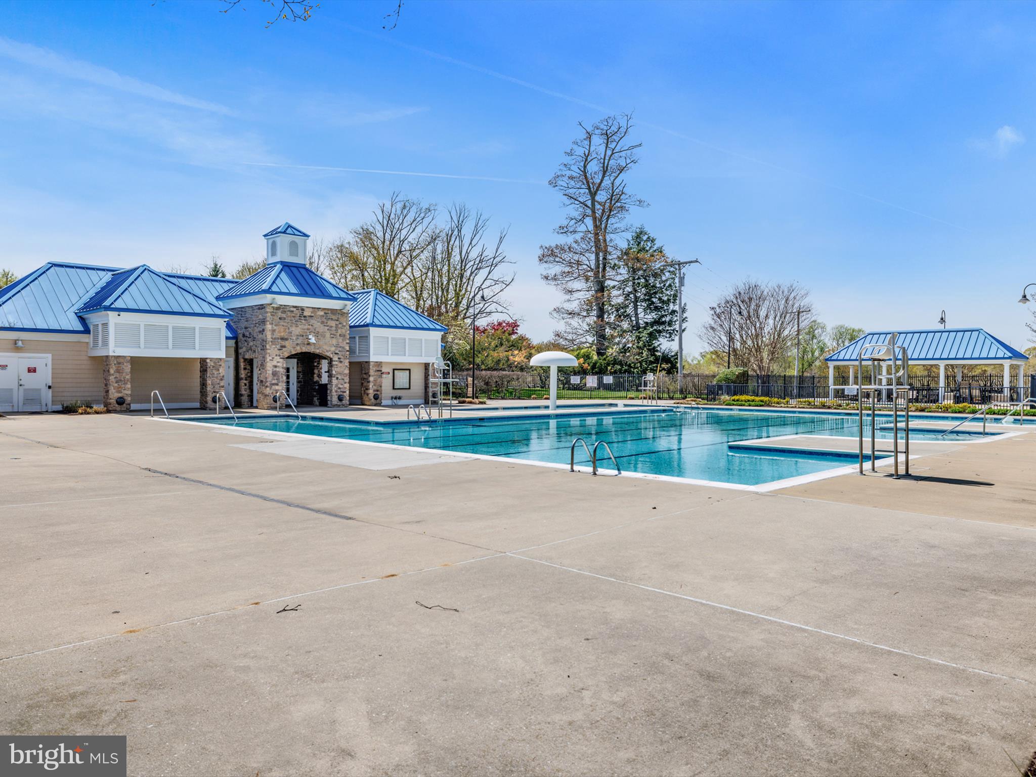 2355 Sandy Walk Way Odenton, MD 21113 - Photo 68 of 68 a view of white house with a big yard and potted plants