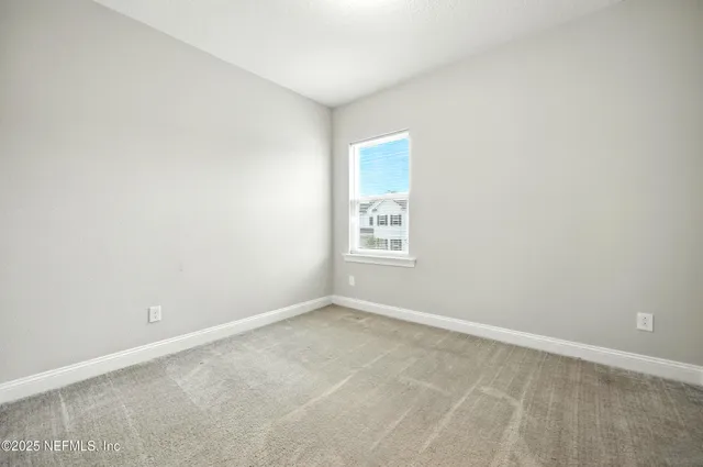 a bathroom with a granite countertop sink toilet a large mirror a bathtub and shower
