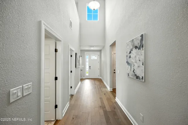 a bathroom with a sink double vanity and a mirror