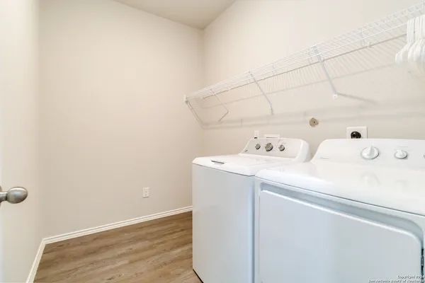 a utility room with dryer and washer