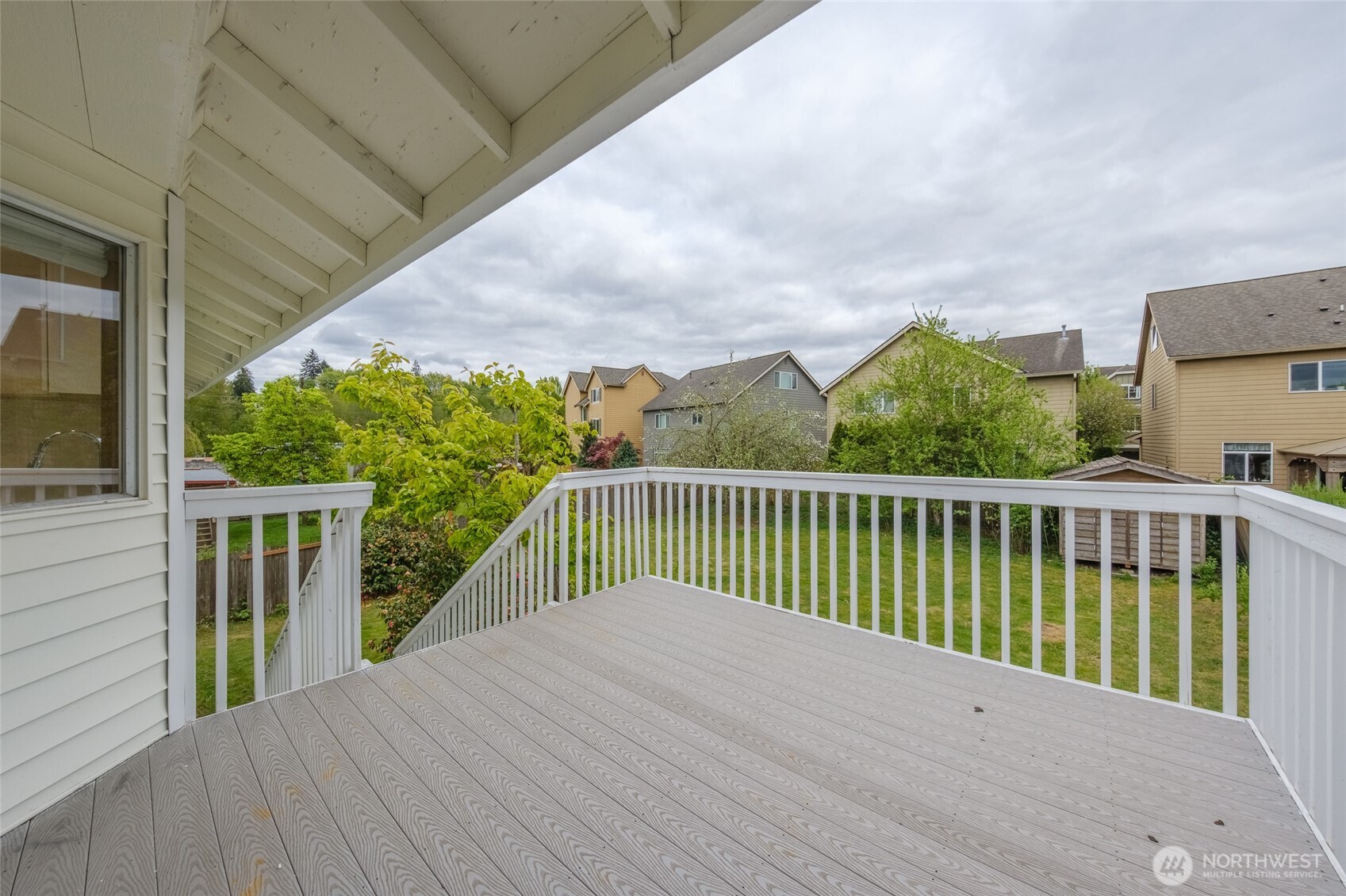 830 234th Street Southeast Bothell, WA 98021 - Photo 23 of 26 a balcony with wooden floor and fence