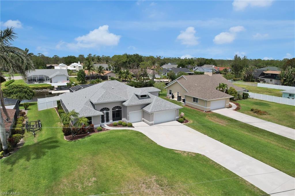 20620 Park Place Estero, FL 33928 - Photo 1 of 28 Aerial view featuring a residential view