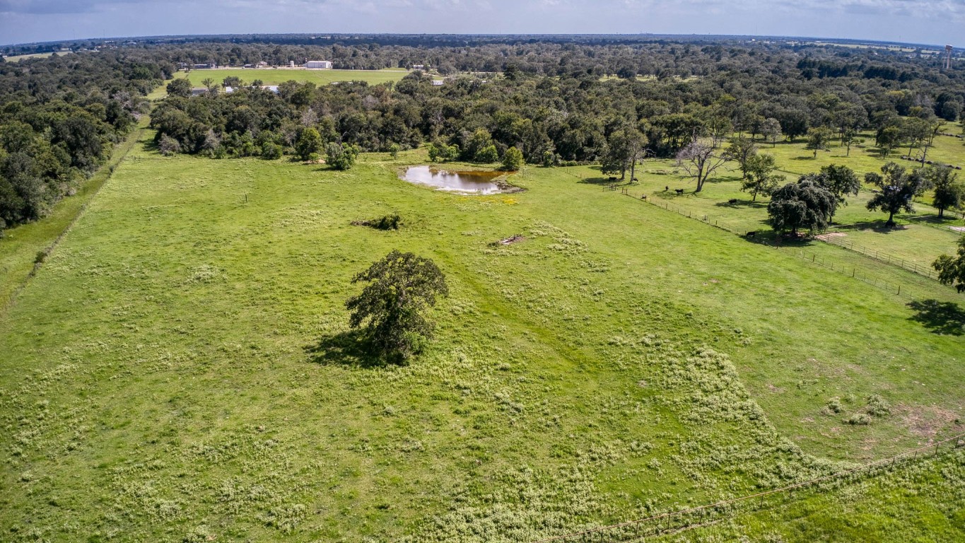 38201 Wiggins Road Hempstead, TX 77445 - Photo 9 of 20 a view of a lake with houses