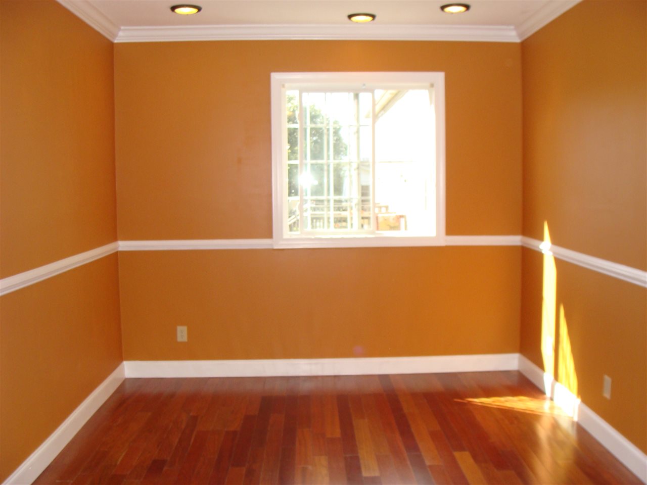 4335 Ottobine Road Dayton, VA 22821 - Photo 32 of 50 a view of an empty room with wooden floor and a window
