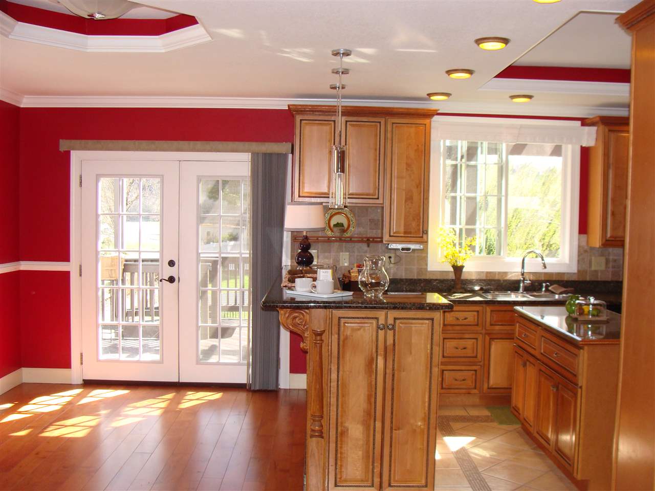 4335 Ottobine Road Dayton, VA 22821 - Photo 7 of 50 a kitchen with granite countertop a stove a sink and a refrigerator